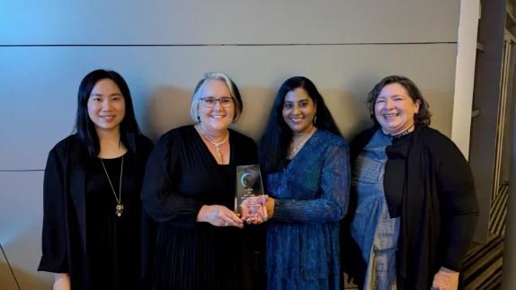 City of Unley team celebrate RIMPA award win with trophy.