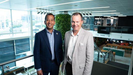 Ed Chung and Pat O’Sullivan in TechnologyOne office