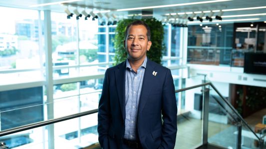 Ed Chung in TechnologyOne office